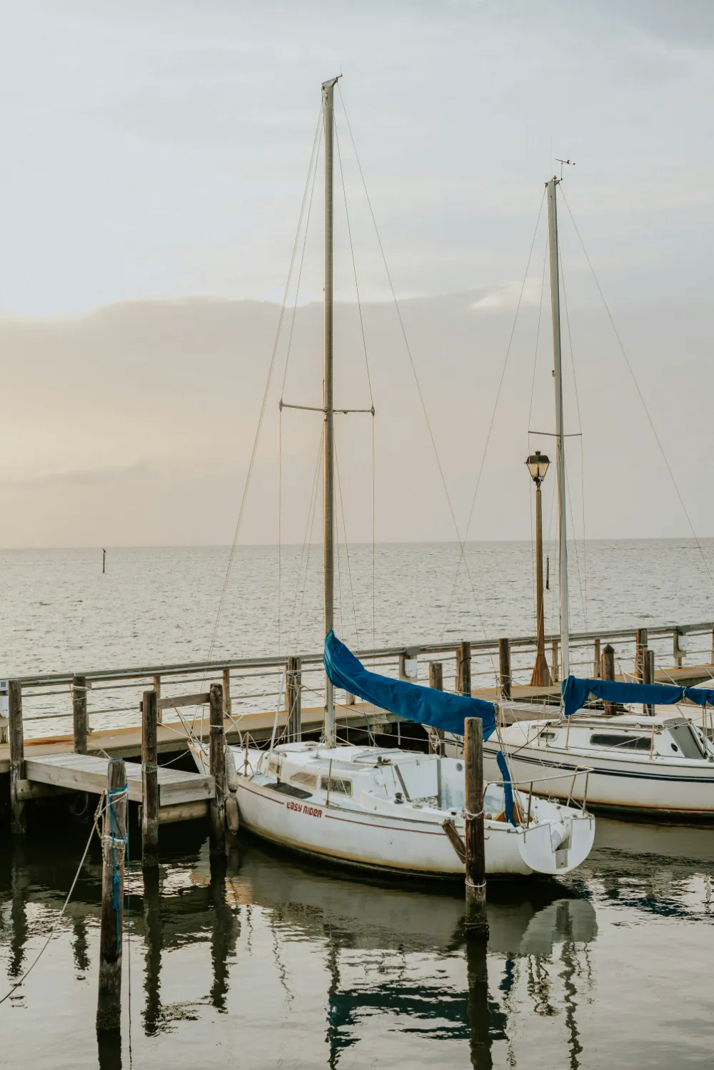 Sailboats docked at a marina on Mobile Bay in Fairhope, AL